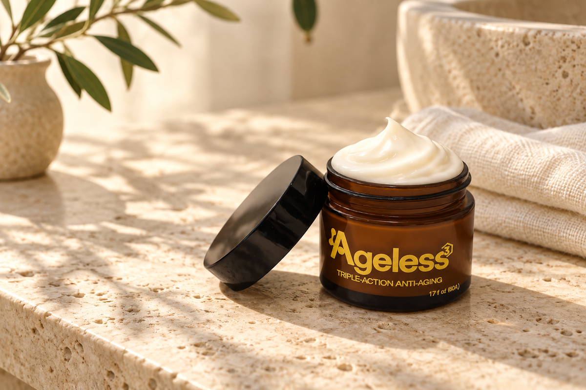 Ageless facial cream on a warm stone counter with linen